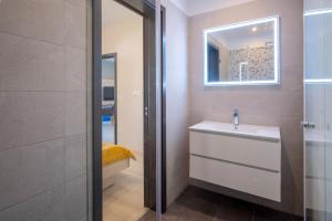 Koupelna v ubytování MF Casa Galerius Apartment
