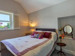 A bed or beds in a room at Coolcormack Stud B&B