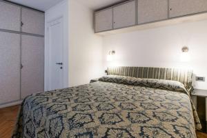 A bed or beds in a room at Ca' Cordoni - Charming Place in the heart of Venice