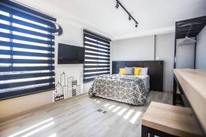 Postel nebo postele na pokoji v ubytování Studio Temático Bem Espaçoso - ALL1503 + 33 fotografií