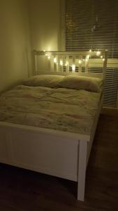 Posteľ alebo postele v izbe v ubytovaní Apartament Zamkowy