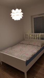 Posteľ alebo postele v izbe v ubytovaní Apartament Zamkowy