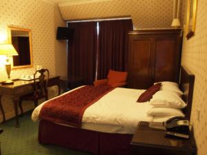 Krevet ili kreveti u jedinici u okviru objekta Argyll Arms Hotel