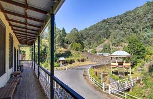 a balcony of a building with a view of a road at Walhalla's Star Hotel in Walhalla
