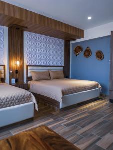 Postel nebo postele na pokoji v ubytování Hotel San Carlos