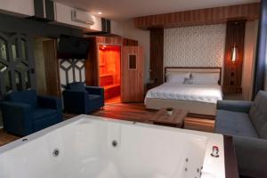 Postel nebo postele na pokoji v ubytování Hotel San Carlos + 7 fotografií