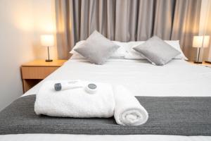 Кровать или кровати в номере Sydney Junction Hotel