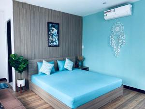 Giường trong phòng chung tại Na Homestay