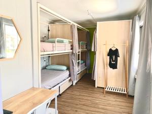 Mumma's Hostel Cairns客房内的一张或多张床位