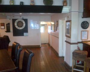 The lobby or reception area at The Friar Tucks 