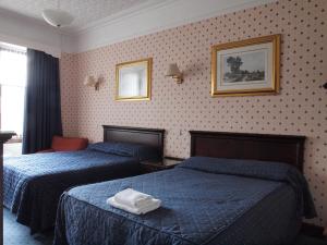 Krevet ili kreveti u jedinici u okviru objekta Argyll Arms Hotel