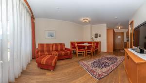 TV a/nebo společenská místnost v ubytování Hotel Garni Elisabeth