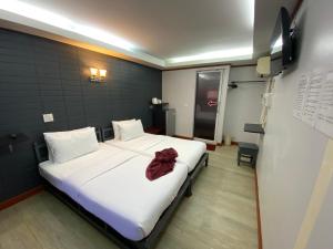 Postel nebo postele na pokoji v ubytování Sinsamut Koh Samed