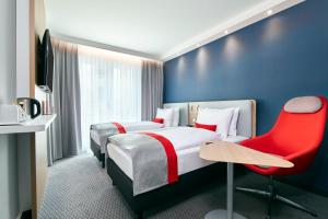 เตียงในห้องที่ Holiday Inn Express - Berlin - Alexanderplatz by IHG +42 ภาพ