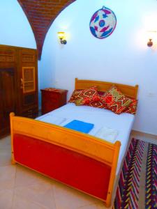 A bed or beds in a room at Villa Sunrise