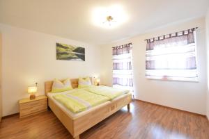 Postel nebo postele na pokoji v ubytování Ferienwohnung Haus Reider