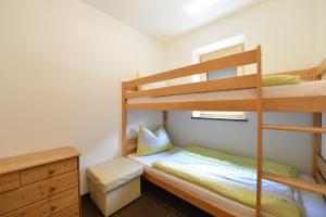 Posteľ alebo postele v izbe v ubytovaní Ferienwohnung Haus Reider