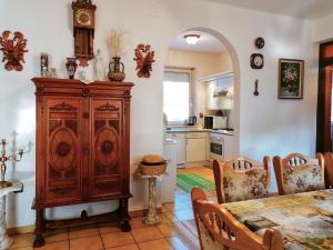 A kitchen or kitchenette at Júlia Vendégház