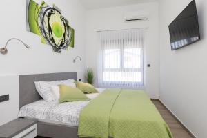 Postel nebo postele na pokoji v ubytování Villa Supernus with Heated Pool