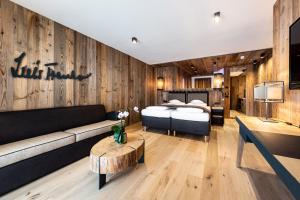 Voodi või voodid majutusasutuse Hotel Arkadia - "Adults Only" toas