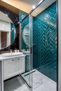 Kúpeľňa v ubytovaní Emerald Lux Apartment. LiveInLviv