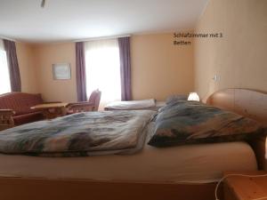 Postel nebo postele na pokoji v ubytování Ferienwohnung Bluemelhube Wohnung Elisabeth