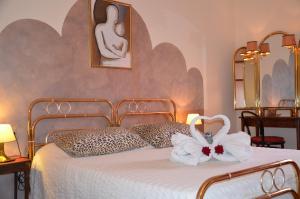 Кровать или кровати в номере B&B Villa Olmo