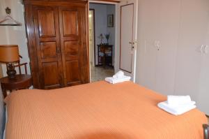 Postel nebo postele na pokoji v ubytování B&B Villa Olmo