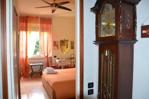 Postel nebo postele na pokoji v ubytování B&B Villa Olmo