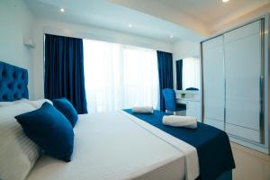Postel nebo postele na pokoji v ubytování Hotel Ambiente Ulcinj