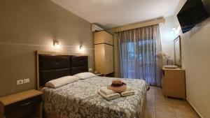 A bed or beds in a room at House Spanos