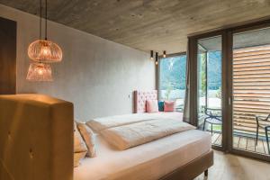 Posteľ alebo postele v izbe v ubytovaní Seehotel Einwaller - adults only