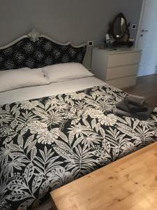 Postel nebo postele na pokoji v ubytování camera con bagno privato e parcheggio