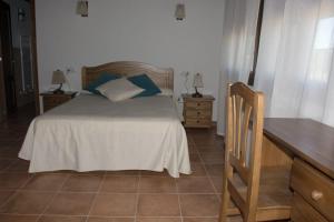 Posteľ alebo postele v izbe v ubytovaní Casa Rural Consuelo