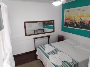 מיטה או מיטות בחדר ב-Pousada Vison
