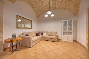 A seating area at Corte Anibaldi Apartment