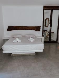 Posteľ alebo postele v izbe v ubytovaní Eternal Suites