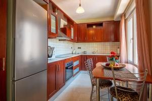 Kuchyňa alebo kuchynka v ubytovaní MariZot Apartment