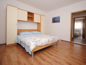 Postel nebo postele na pokoji v ubytování Spacious apartment Antea