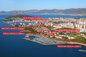 an aerial view of a city with a harbor at Luxury Rooms Pino in Split