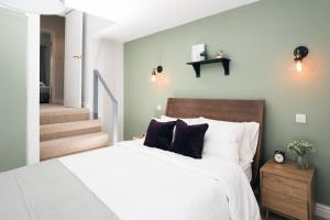Posteľ alebo postele v izbe v ubytovaní Basin Cottage Peak District