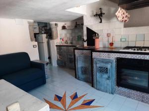 A kitchen or kitchenette at Il Nido 1