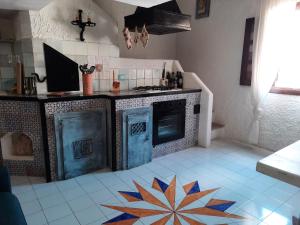 A kitchen or kitchenette at Il Nido 1