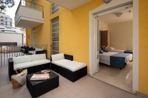 Posteľ alebo postele v izbe v ubytovaní Hotel Cannes - in pieno centro