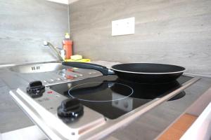 Кухня или кухненски бокс в Apartment Hotel Wittenau