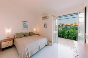 Tempat tidur dalam kamar di Villa San Lorenzo