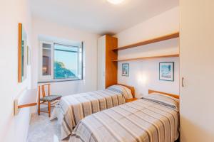 Tempat tidur dalam kamar di Villa San Lorenzo