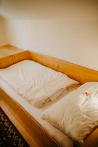 Łóżko lub łóżka w pokoju w obiekcie Ferienwohnung Vidmar