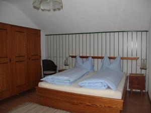 Łóżko lub łóżka w pokoju w obiekcie Ferienwohnung Laserer