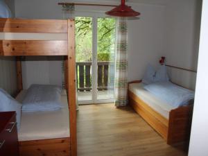 Łóżko lub łóżka w pokoju w obiekcie Ferienwohnung Laserer